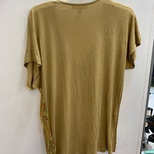 A gold shirt